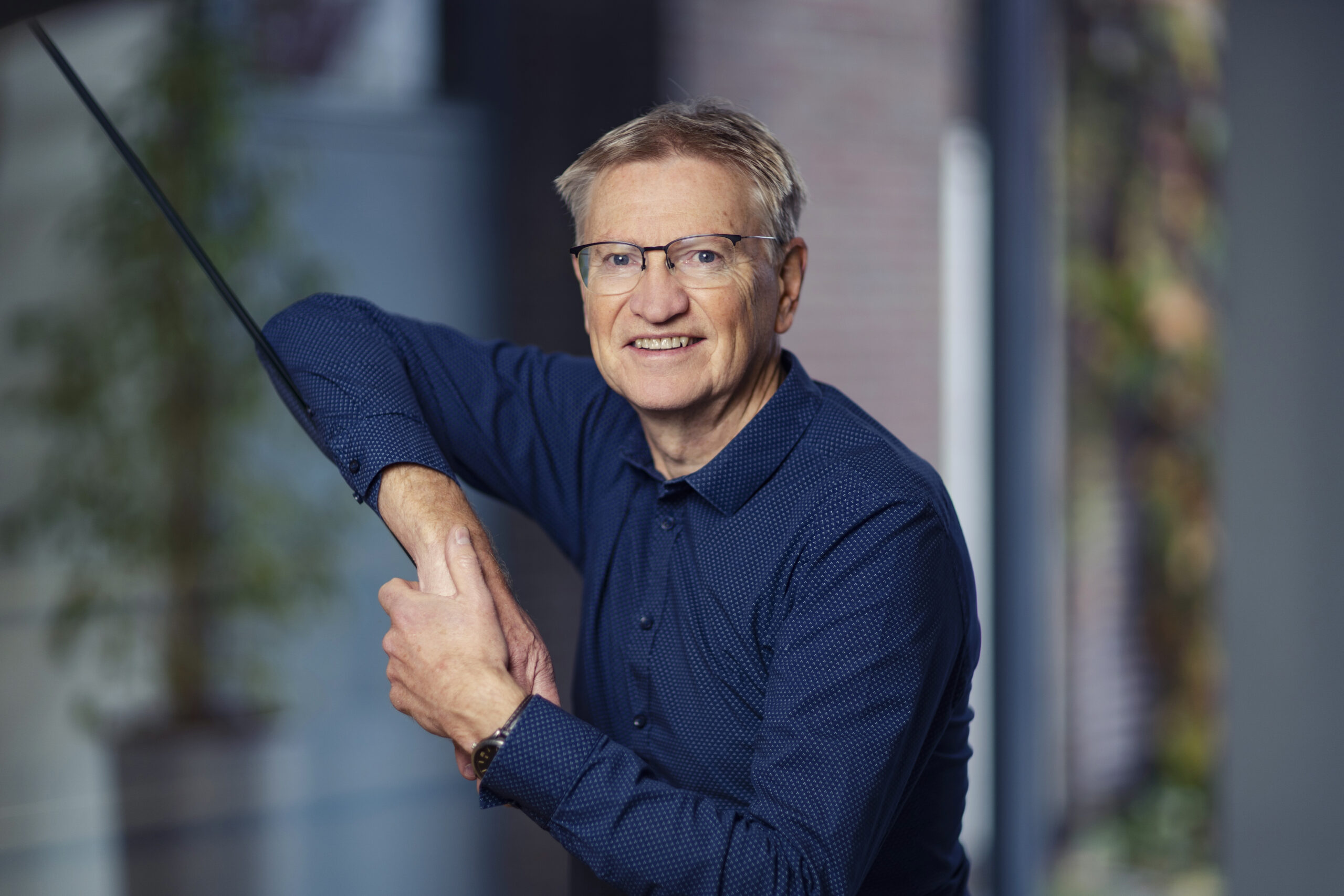 Portretfoto van Rolf Herfst, voormalig fysiotherapeut en docent bij Intramed
